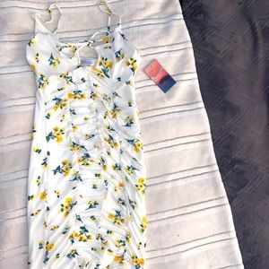 Size small, Made in Indonesia, tight fitting short dress